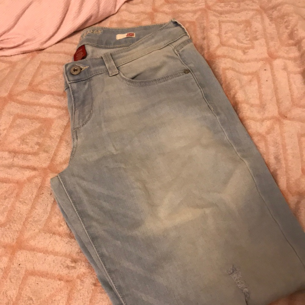 Ripped blue jeans